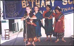 Children performing at a school function.
